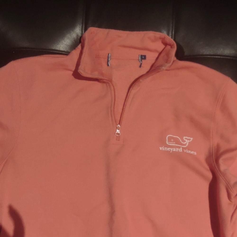 This is a one quarter zip vineyard Vines sweatshirt.